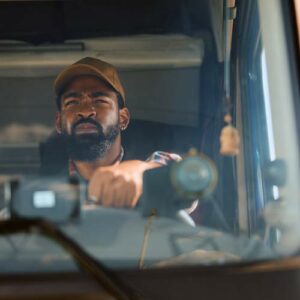 truck driver in cab, front view